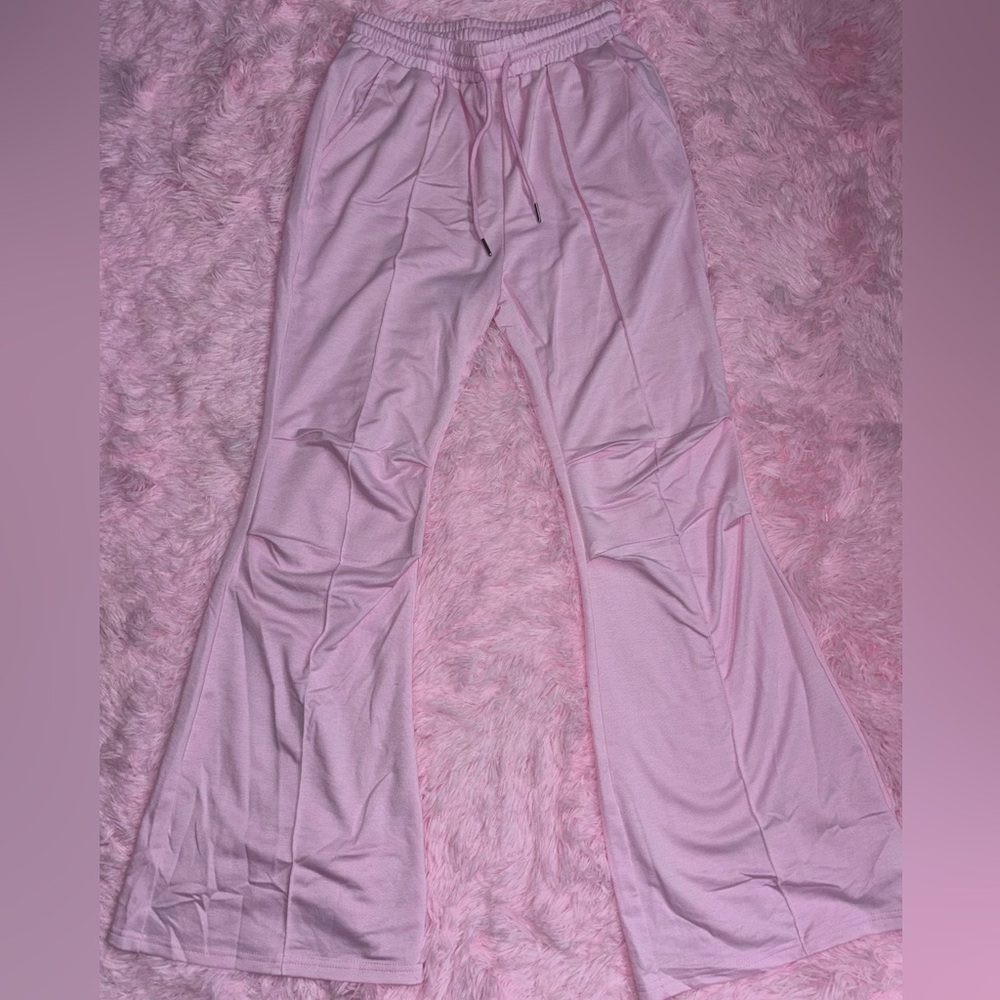 BRAND NEW WITH TAGS! Women's Pink Flared Pants - Size Medium
